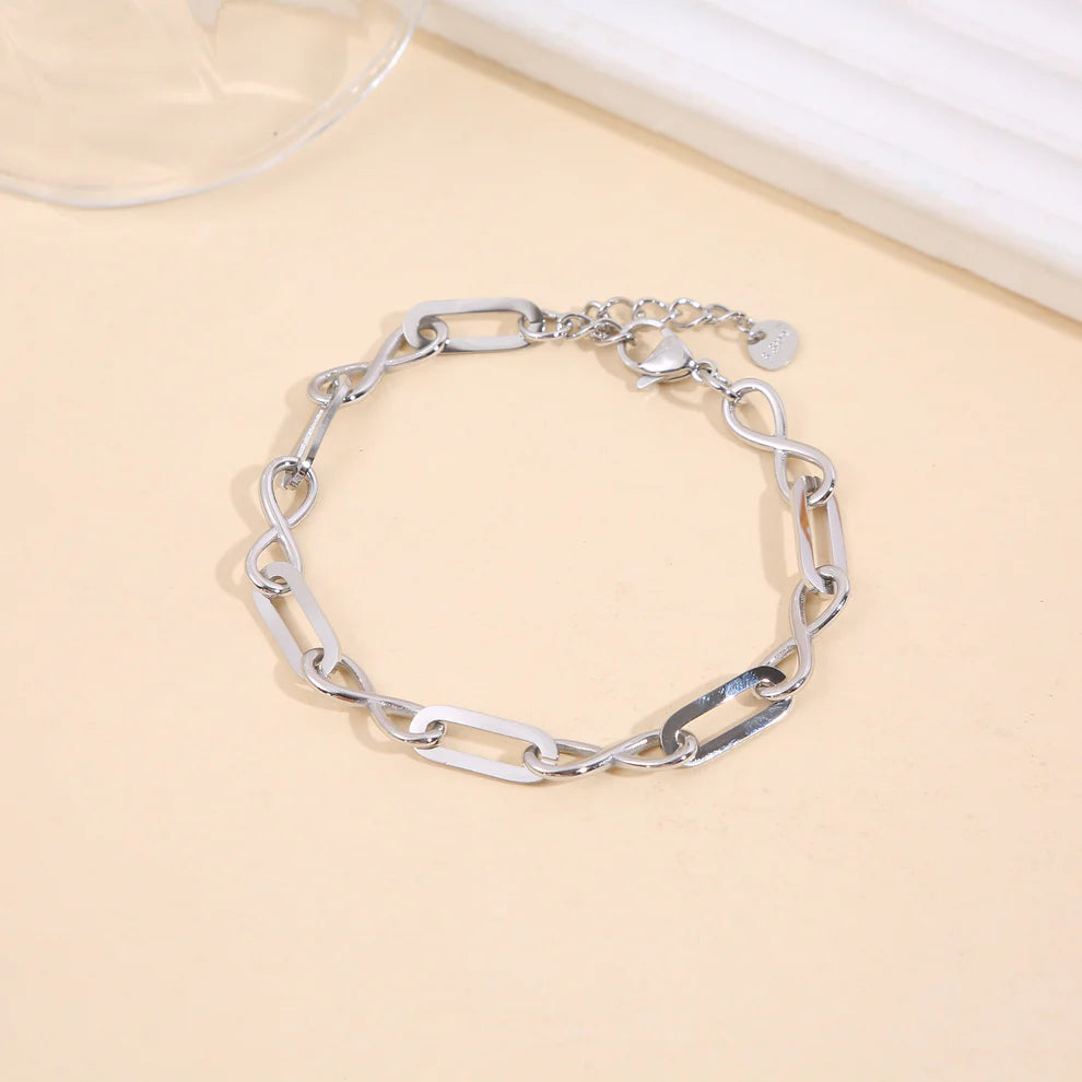 Bracelet doré ou argenté chaîne alternée maillons rectangulaires plats et signe infini